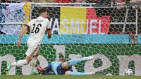 Gelandang Belgia Thorgan Hazard merayakan gol ke gawang Denmark pada laga Grup B Euro 2020, Kamis (17/6/2021) atau Jumat dini hari WIB. (AFP/Jonathan Nackstrand)