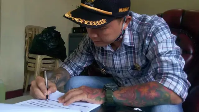 5 Fakta Hoho Alkaf, Kades Banjarnegara Bertato di Sekujur Tubuh yang Viral