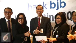 Pendapatan bunga bersih yang tumbuh sebesar 25,9 persen (YoY) dan fee based income yang tumbuh 8,4 persen (YoY) menjadi faktor utama penyumbang laba bersih Bank BJB, Jakarta, Kamis (28/7). (Liputan6.com/Angga Yuniar)