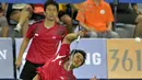 Ganda Putra Indonesia Muhamad Ahsan dan Hendra Setiawan mengembalikan kok ke arah ganda Korsel Yongdae Lee dan Yeonseong Yoo pada final Ganda Putra Asian Games ke-17 di Gyeyang Gymnasium, Incheon, Korsel, (28/9). (ANTARA FOTO/Saptono)