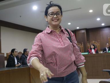 Terpidana dalam kasus korupsi proyek e-KTP, Miryam S Haryani usai menjadi saksi dalam sidang lanjutan kasus dugaan korupsi terkait pengadaan e-KTP dengan terdakwa Markus Nari di Pengadilan Tipikor, Jakarta, Rabu (9/10/2019). (Liputan6.com/Helmi Fithriansyah)