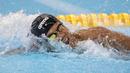 Jendi Panggabean perenang Indonesia saat beraksi pada kualifikasi cabang renang nomor 100 meter gaya bebas putra klasifikasi S9 di Stadion Akuatik, Gelora Bung Karno Jakarta, Senin (8/10/2018).  (Bola.com/Peksi Cahyo)