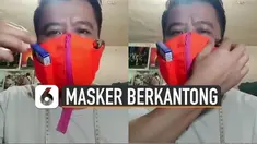 Warga Indonesia memang sangat kreatif. Terbukti pria ini bisa membuat masker berkantong yang dapat diisi beberapa barang.