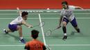 Ganda Putri Indonesia, Greysia Polii/Apriyani Rahayu, saat melawan wakil China, Liu Xuan Xuan/Xia Yu Ting, pada laga Indonesia Masters di Istora, Jakarta, Rabu (15/1/2020). Greysia/Apriyani menang 22-24, 21-17, dan 21-15. (Bola.com/M Iqbal Ichsan)