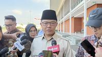 Menteri Luar Negeri (Menlu) Sugiono di Pangkalan TNI AU Halim Perdanakusuma Jakarta Timur, Selasa (14/10/2025) (Liputan6.com/Lizsa Egeham)