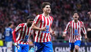 Selebrasi Julian Alvarez usai mencetak gol di laga Atletico Madrid vs Arsenal di leg 1 semifinal Liga Champions 2025/2026 di Riyadh Air Metropolitano, Kamis (30/04/2026) dini hari WIB. (AP Photo/Manu Fernandez)