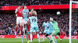 Tambahan kemenangan membuat Arsenal kukuh di puncak klasemen dengan 82 poin dari 37 pertandingan. Mereka kini unggul lima angka dari Manchester City yang belum memainkan laganya. (AP Photo/Kirsty Wigglesworth)