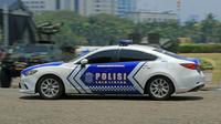 Ilustrasi mobil polisi. (Foto oleh Jeffry Surianto: https://www.pexels.com/id-id/foto/jalan-mobil-kendaraan-polisi-18507435/)