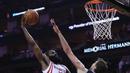 Pebasket Houston Rockets, James Harden, berusaha memasukan bola saat melawan San Antonio Spurs pada laga Gim 3 semifinal Wilayah Barat di Toyota Center, Jumat (5/5/2017). San Antonio Spurs menang 103-92. (AFP/Ronald Martinez)