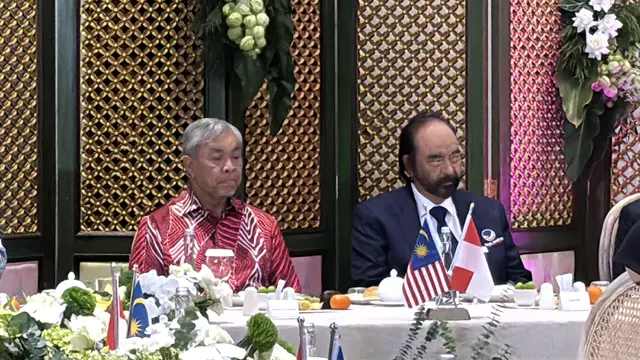 Surya Paloh dan Wakil Perdana Menteri Malaysia sekaligus Presiden UMNO Ahmad Zahid Hamidi