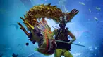 Penyelam saat melakukan pertunjukan barongsai naga pada pengunjung South East Asia Aquarium di Resorts World Sentosa, Singapura, Rabu (25/1). Pertunjukan barongsai di bawah permukaan laut itu untuk menyambut Tahun Baru Imlek 2568. (AP Photo/Wong Maye-E)