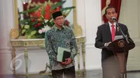 Presiden Jokowi saat mengumumkan, Biaya Penyelenggaraan Ibadah Haji (BPIH) di Istana Merdeka, Jakarta, Rabu (27/5/2015). Penurunan biaya haji ini dapat terbilang cukup drastis, yaitu dari US$ 3.219 menjadi US$ 2.717. (Liputan6.com/Faizal Fanani)
