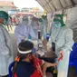 Rapid test yang dilakukan di Pasar Pinasungkulan Karombasan, Manado, baru-baru ini.