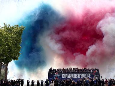 Parade pemain Paris Saint-Germain (PSG) di jalan Champs-Elysees, Paris, Prancis pada 1 Juni 2025. (Thibaud MORITZ/AFP)
