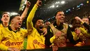 Kemenangan 4-2 di kandang membawa Dortmund lolos ke semifinal karena unggul agregat 5-4. (INA FASSBENDER / AFP)