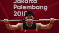 Rahmat Erwin Abdullah tampil di kelas 77 kg pada Asian Games 2018 lalu (ANTARA FOTO/INASGOC/Helmi Afandi/YU/18.)