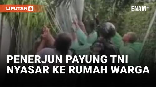 VIDEO: Penerjun Payung TNI Terpaksa Mendarat di Rumah Warga Jaksel