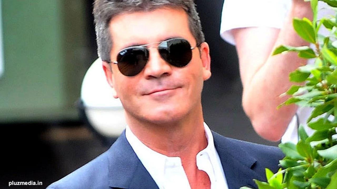 simon-cowell-kacamata-130827b.jpg