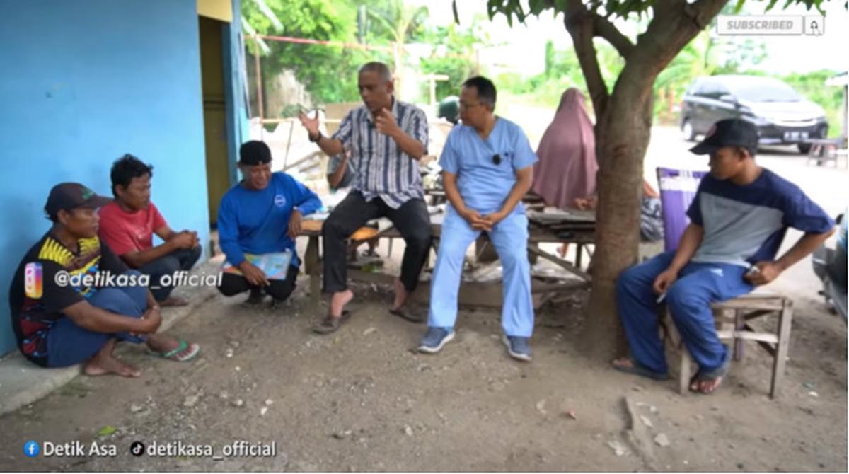 relawan bantu rumah kumuh