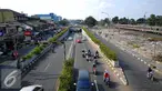 Memasuki Lebaran H+5, jalan utama Pasar Minggu, Jakarta Selatan masih terlihat lenggang, Jakarta, Rabu (22/7/2015). (Liputan6.com/Yoppy Renato)