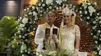 Bek sayap Persija Jakarta, Alfath Faathier, melangsungkan akad pernikahan dengan Ratu Rizky Nabila di Jakarta, Minggu (29/3/2020). (Dok. Media Persija)