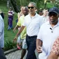 Mantan Presiden Amerika Serikat Barack Obama bersama keluarga dan rombongannya mengunjungi Pura Tirta Empul, Tampaksiring, Gianyar, Bali, Selasa (27/6). (Liputan6.com/Immanuel Antonius)