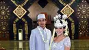 Kamis, 11 Mei 2017, gitaris Maliq and D’Essential resmi mempersunting Fikha yang telah menjadi kekasihnya selama empat tahun belakangan ini. Pernikahan berlangsung di Masjid At Tin, Taman Mini Indonesia, Jakarta Timur. (Nurwahyunan/Bintang.com)