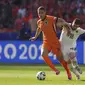Gelandang Belanda Joey Vermann saat beraksi melawan Austria pada laga terakhir grup D di Euro 2024 (AP)