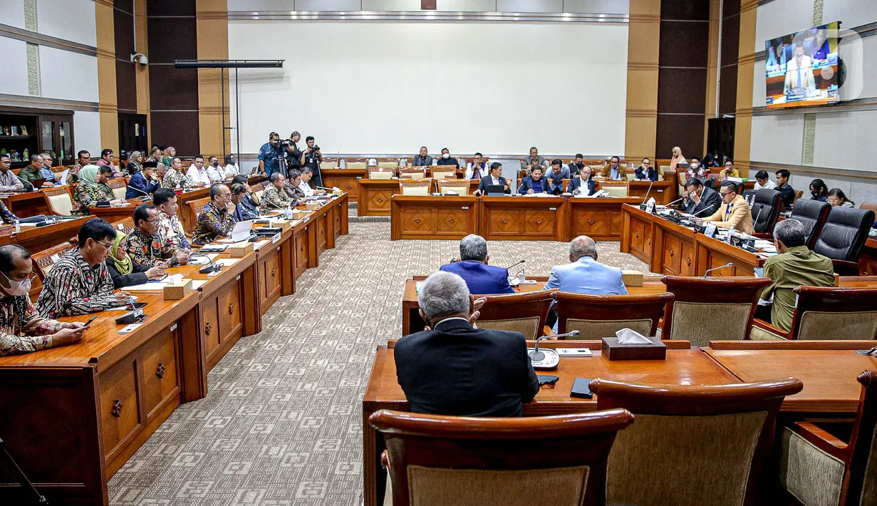 Mahfud dan Sri Mulyani hadir sebagai Komite Koordinasi Nasional Pencegahan dan Pemberantasan TPPU. Keduanya duduk bersebelahan. (Liputan6.com/Faizal Fanani)