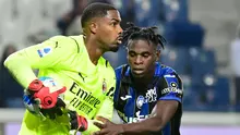Mike Maignan mampu tampil meyakinkan di Liga Italia bersama klub barunya, AC Milan. Meski belum mampu berbicara banyak di Liga Champions, ia tercatat sukses melakukan tiga kali clean sheet dalam tujuh laga di Serie A musim ini. (AFP/Miguel Medina)