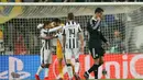 Juventus akhirnya berhasil mengunci kemenangan 2-1 atas Real Madrid. (AFP PHOTO/MARCO BERTORELLO)