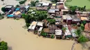 Pemandangan udara dari desa yang terdampak banjir di Distrik Darbhanga, Negara Bagian Bihar, India timur pada 26 Juli 2020. Sedikitnya 10 orang tewas dan hampir 1,5 juta orang terkena dampak akibat banjir di 11 distrik di Bihar, papar Departemen Manajemen Bencana Bihar. (Xinhua/Partha Sarkar)