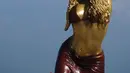Patungnya menunjukkan tarian perut ikonik penyanyi bernama lengkap Shakira Isabel Mebarak Ripoll dari lagu Hips Don't Lie tahun 2005. (STR / AFP)