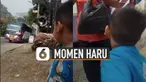 Sang anak nampak kegirangan bertemu ayahnya meski hanya sejenak di tepi jalan.