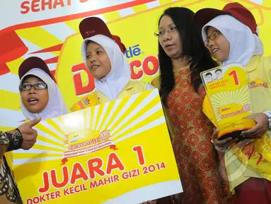 SDN 3 Sedayu Yogyakarta keluar sebagai juara pertama kompetisi Dokter Kecil-Mahir Gizi, Jakarta, Jumat (20/3/2015). (Liputan6.com/Herman Zakharia)