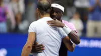 Kejutan terjadi pada kejuaraan tenis US Open 2022, Selasa (6/9/2022). Langkah Rafael Nadal terhenti di babak 16 besar. Petenis asal Spanyol itu dipaksa menyerah oleh Frances Tiafoe, 4-6, 6-4, dan 3-6. (AFP/Mike Stobe)