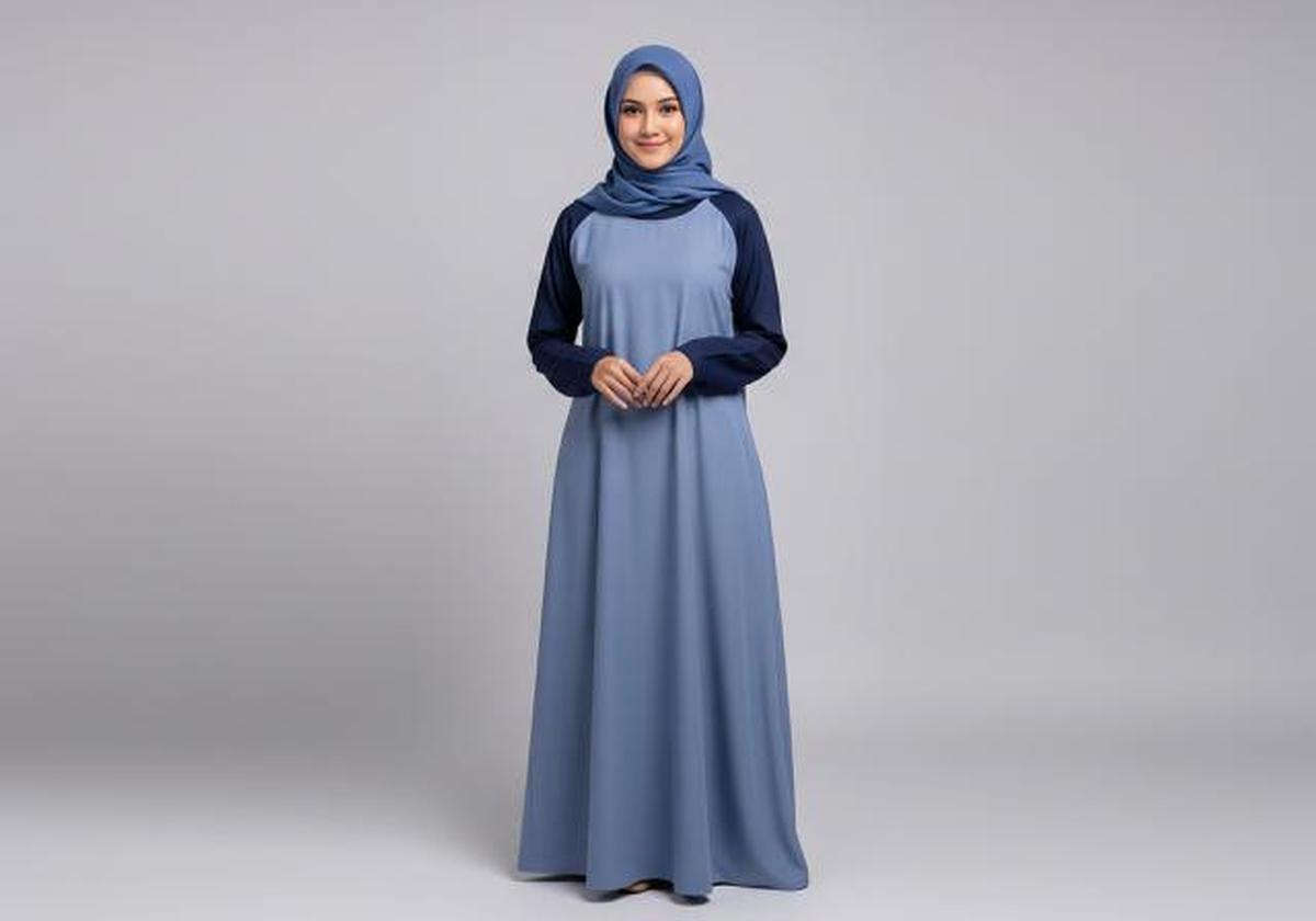Gamis Lengan Raglan Kombinasi Dua Warna/Ide Model Gamis Simple untuk Kelompok Pengajian (Sumber: gemini.com)