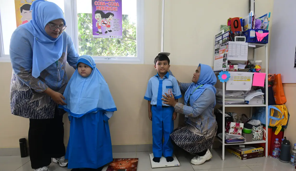 Pemerintah memulai pelaksanaan program Cek Kesehatan Gratis (CKG) Sekolah secara serentak pada Senin (4/8/2025). (Merdeka.com/Arie Basuki)