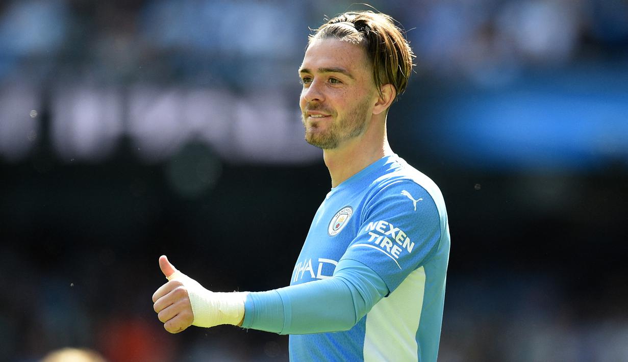 Jack Grealish tetap menjadi rekrutan termahal di bursa transfer musim panas 2021/2022 usai kepindahannya dari Aston Villa ke Manchester City. Harry Kane yang digadang-gadang akan melampaui nilai transfer Jack Grealish nyatanya tetap berseragam Tottenham. (Foto: AFP/Oli Scarff)