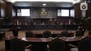Suasana sidang uji materi Undang-Undang Nomor 35 Tahun 2009 tentang Narkotika terhadap UUD 1945 atau legalisasi ganja untuk medis di Gedung Mahkamah Konstitusi, Jakarta, Rabu (20/7/2022). MK menolak legalisasi ganja medis untuk kesehatan yang dinyatakan dalam putusan perkara nomor 106/PUU-XVIII/2020. (Liputan6.com/Faizal Fanani)