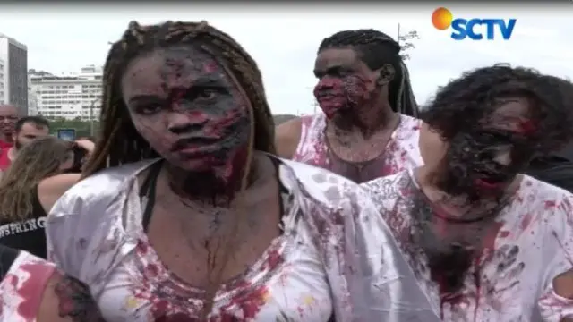 Puluhan 'Zombie' Rayakan Hari Kematian di Pantai Copacabana