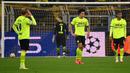 Borussia Dortmund bernasib sama dengan Barcelona di Liga Champions musim ini. Mereka harus puas finis di urutan ketiga dan turun kasta ke Liga Europa. Sebelumnya, Dortmund juga pernah mengalami hal serupa pada musim 2016/17. Mereka hanya sampai di babak 16 besar saja. (AFP/Ina Fassbender)