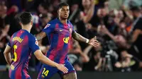 Pemain Barcelona, Marcus Rashford, merayakan gol pembuka dalam pertandingan Liga Spanyol melawan Real Madrid di Camp Nou, Spanyol, Senin (11/5/2026) dini hari WIB. (AP Photo/Joan Mateu Parra)