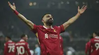 Pemain Liverpool, Mohamed Salah melakukan selebrasi setelah mencetak gol ketiga timnya ke gawang Newcastle pada laga lanjutan Liga Inggris 2024/2025 di St James Park Stadium, Newcastle, Inggris, Kamis (05/12/2024) WIB. (AP Photo/Ian Hodgson)