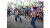 Tradisi Ojung (Sumber: lumajangkab.go.id)