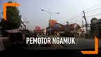 Seorang pemotor yang tak terima diklakson oleh pengendara mobil langsung mengamuk di jalan. Tanpa pikir panjang, pemotor langsung memecahkan kaca mobil dan mengancam pengemudi.