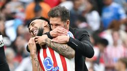 Skuad asuhan Diego Simeone menang 5-2 dalam derby Madrid di Stadion Wanda Metropolitano. (AFP/Javier Soriano)