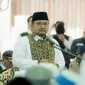 Menteri Agama (Menag) Yaqut Cholil Qoumas saat menyambut kedatangan jemaah haji kelompok terbang (kloter) 63 Embarkasi Jakarta (JKG 63) di Asrama Haji Pondok Gede, Jakarta, Minggu (21/7/2024). (Dok. Tim Humas Kementerian Agama)