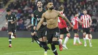 Mohamed Salah berhasil mengukir brace saat Liverpool meraih kemenangan 3-2 atas Southampton&nbsp;di St. Mary's Stadium pada laga pekan ke-12 Premier League, Minggu (24/11/2024) malam WIB. (AP Photo/Sean Ryan)