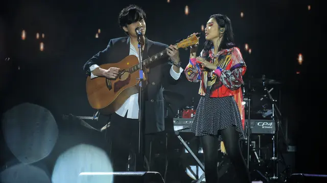 [Fimela] Isyana Sarasvati dan Suami